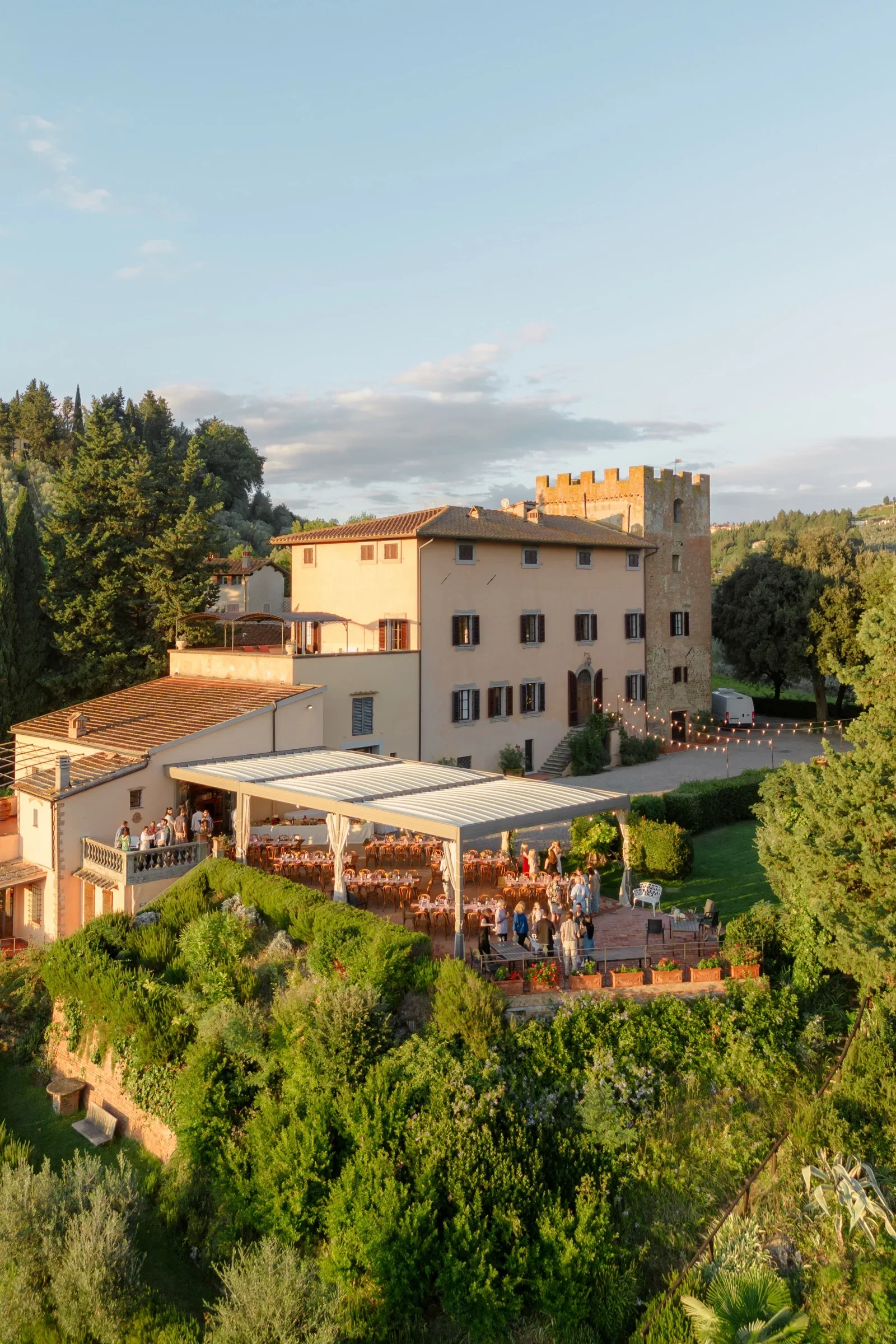 Villa Il Pozzo and its tower seen across the valley in the last warm light of the day